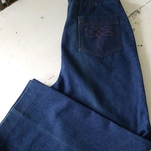 Vintage mom-style high waisted, wide legged jeans.